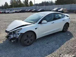 Salvage cars for sale from Copart Graham, WA: 2022 Tesla Model 3