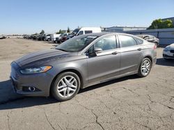 Salvage cars for sale at Bakersfield, CA auction: 2014 Ford Fusion SE