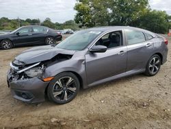 Carros salvage sin ofertas aún a la venta en subasta: 2017 Honda Civic Touring