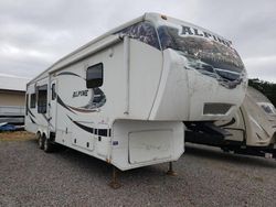 Salvage trucks for sale at Avon, MN auction: 2011 Keystone Alpine