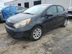 Salvage cars for sale at Jacksonville, FL auction: 2013 KIA Rio LX