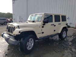 SUV salvage a la venta en subasta: 2011 Jeep Wrangler Unlimited Sahara