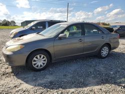 Flood-damaged cars for sale at auction: 2005 Toyota Camry LE