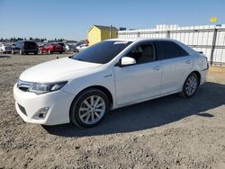 Carros salvage a la venta en subasta: 2014 Toyota Camry Hybrid