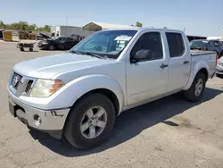 Salvage trucks for sale at Fresno, CA auction: 2010 Nissan Frontier Crew Cab SE