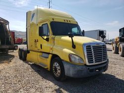 Salvage trucks for sale at Magna, UT auction: 2013 Freightliner Cascadia 125