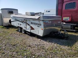 Salvage trucks for sale at Central Square, NY auction: 2012 Wildwood Rockwood