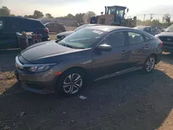 Carros dañados por inundaciones a la venta en subasta: 2018 Honda Civic LX