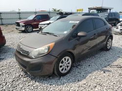 Salvage cars for sale from Copart Cahokia Heights, IL: 2012 KIA Rio EX