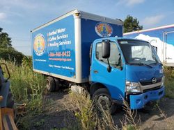 Salvage trucks for sale at Montreal Est, QC auction: 2013 Hino 195