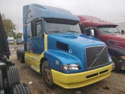 Salvage trucks for sale at Elgin, IL auction: 2001 Volvo VN VNL