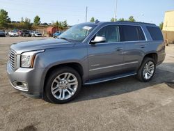 GMC salvage cars for sale: 2019 GMC Yukon SLT