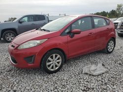 Salvage cars for sale at Wayland, MI auction: 2011 Ford Fiesta SE