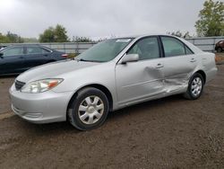 Toyota salvage cars for sale: 2004 Toyota Camry LE