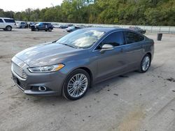 Salvage cars for sale at Ellwood City, PA auction: 2014 Ford Fusion SE