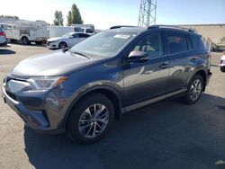 Salvage cars for sale at Hayward, CA auction: 2018 Toyota Rav4 HV LE