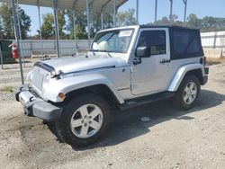 Salvage SUVs for sale at auction: 2009 Jeep Wrangler Sahara