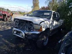 Salvage trucks for sale at Woodburn, OR auction: 2000 Ford F350 SRW Super Duty