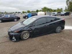 Salvage cars for sale at London, ON auction: 2020 Toyota Prius Prime LE