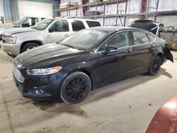 Salvage cars for sale at Eldridge, IA auction: 2014 Ford Fusion SE