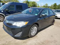 Carros híbridos a la venta en subasta: 2014 Toyota Camry Hybrid