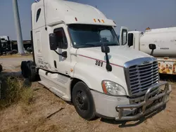 Salvage trucks for sale at Farr West, UT auction: 2012 Freightliner Cascadia 125