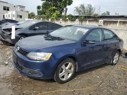 Salvage cars for sale at Opa Locka, FL auction: 2011 Volkswagen Jetta TDI