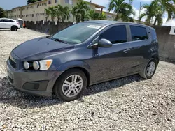 Salvage cars for sale at Opa Locka, FL auction: 2012 Chevrolet Sonic LT