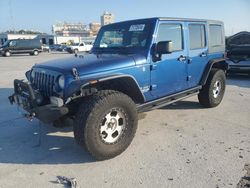 Flood-damaged cars for sale at auction: 2010 Jeep Wrangler Unlimited Rubicon