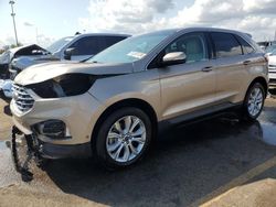 Salvage cars for sale at Woodhaven, MI auction: 2020 Ford Edge Titanium