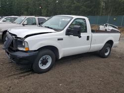 Salvage trucks for sale at Graham, WA auction: 2003 Ford F250 Super Duty