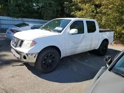 Salvage trucks for sale at Exeter, RI auction: 2010 Nissan Frontier Crew Cab SE