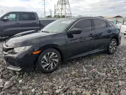 Flood-damaged cars for sale at auction: 2019 Honda Civic LX