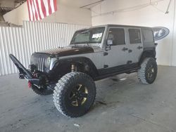 Jeep salvage cars for sale: 2014 Jeep Wrangler Unlimited Sport