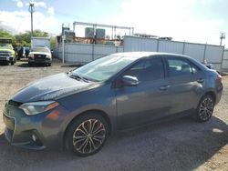 Salvage cars for sale at auction: 2014 Toyota Corolla L