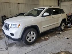 Salvage cars for sale from Copart Franklin, WI: 2011 Jeep Grand Cherokee Laredo