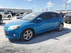 Salvage cars for sale from Copart Haslet, TX: 2012 Ford Focus SE