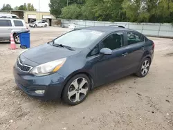 Salvage cars for sale from Copart Knightdale, NC: 2013 KIA Rio EX