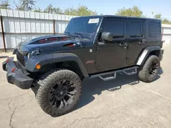 Salvage cars for sale at Fresno, CA auction: 2014 Jeep Wrangler Unlimited Rubicon