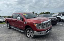 Buy Salvage Trucks For Sale now at auction: 2016 Nissan Titan XD SL