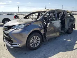 Salvage cars for sale at Sun Valley, CA auction: 2021 Toyota Sienna XLE