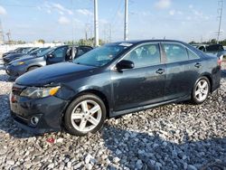 Flood-damaged cars for sale at auction: 2014 Toyota Camry L