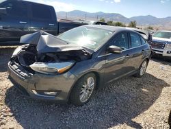 Salvage cars for sale at Magna, UT auction: 2015 Ford Focus Titanium