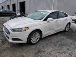 Salvage cars for sale at Jacksonville, FL auction: 2013 Ford Fusion SE Hybrid