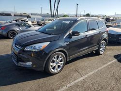 Salvage cars for sale at Van Nuys, CA auction: 2014 Ford Escape Titanium