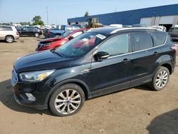 Salvage cars for sale at Woodhaven, MI auction: 2017 Ford Escape Titanium