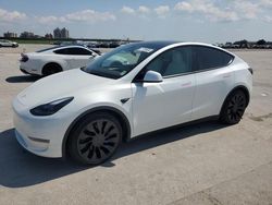 Carros dañados por inundaciones a la venta en subasta: 2024 Tesla Model Y