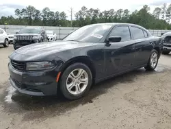 Flood-damaged cars for sale at auction: 2021 Dodge Charger SXT