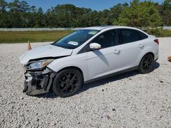 Salvage cars for sale at Houston, TX auction: 2013 Ford Focus SE