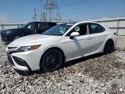 Flood-damaged cars for sale at auction: 2024 Toyota Camry XSE